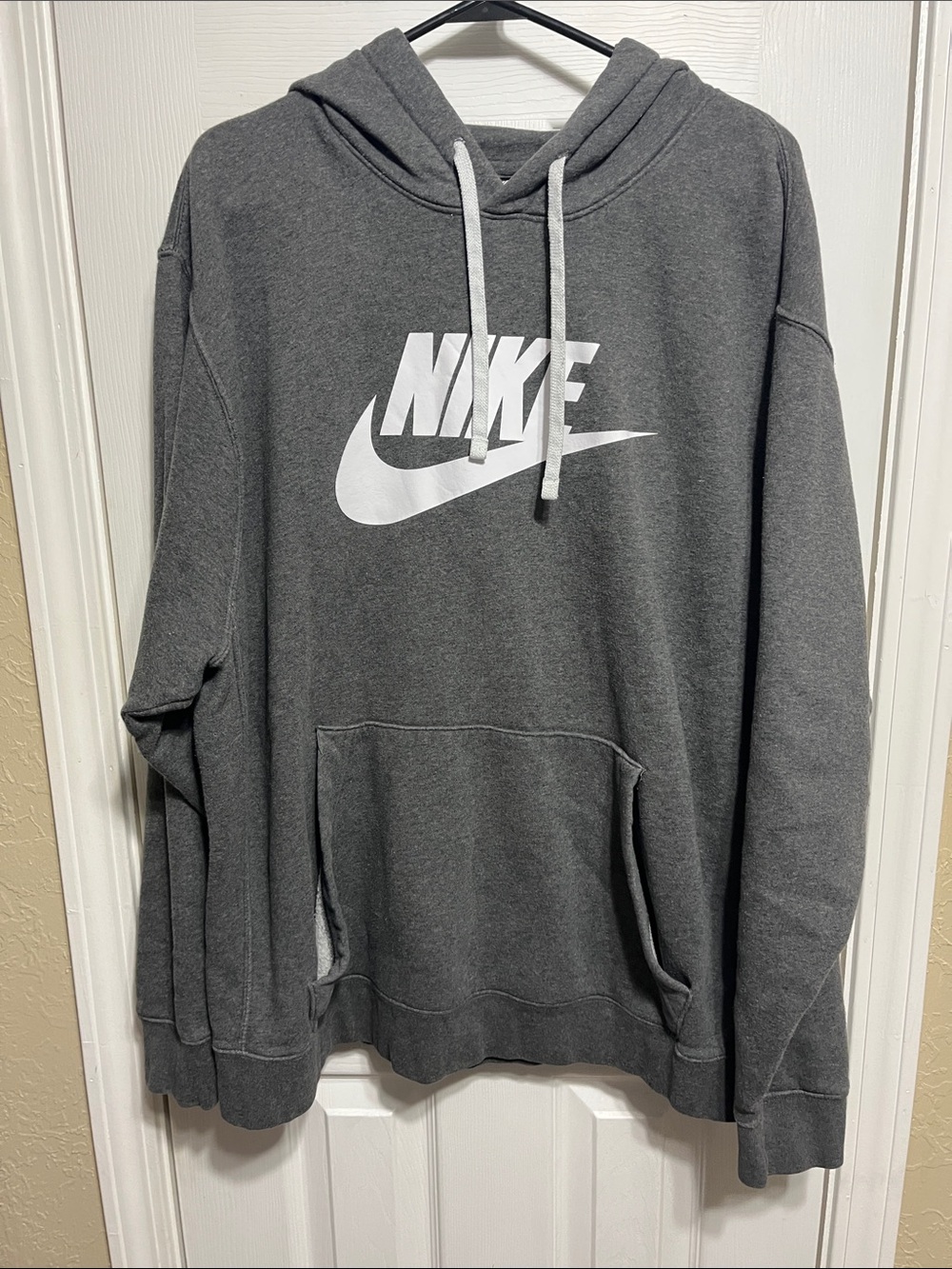 Nike Gray Pullover Hoodie with White Swoosh Logo